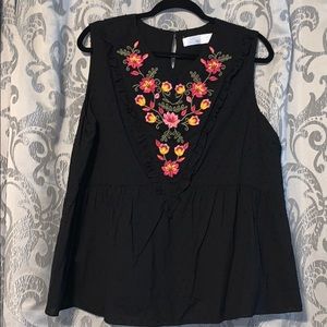 Floral embroidered peplum top